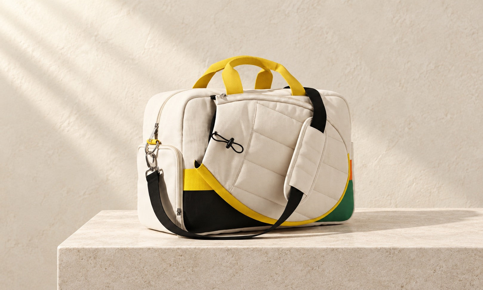 Ivory Cambrille tennis carryall with yellow handles, racket pocket and black shoulder strap